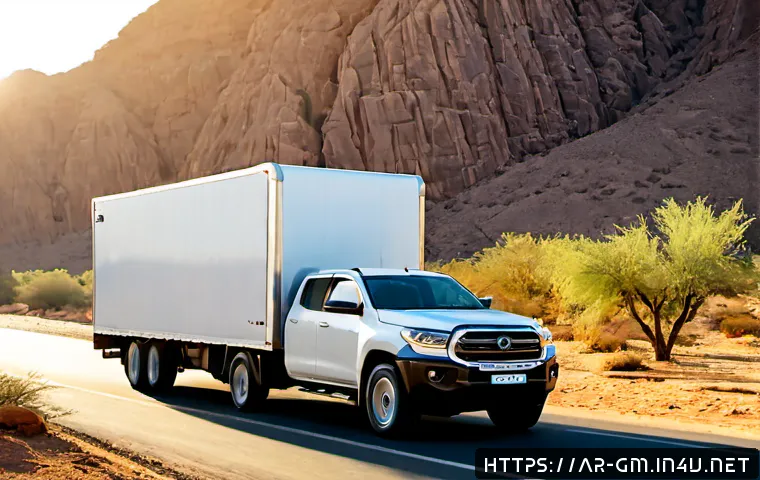 지엠 쉐보레 콜로라도의 견인력 평가 - Photorealistic midsize pickup truck towing a large enclosed utility trailer up a gently rising highw...